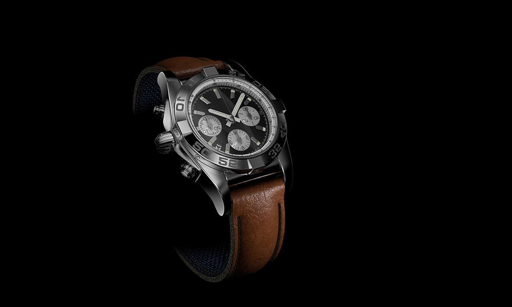 A luxury watch that resembles the Rolex Daytona against a black backdrop.