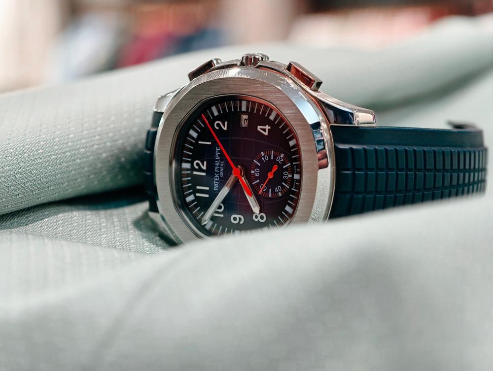 An image of a Patek Philippe Aquanaut is displayed as the owner considers how much a Patek Philippe watch is worth.