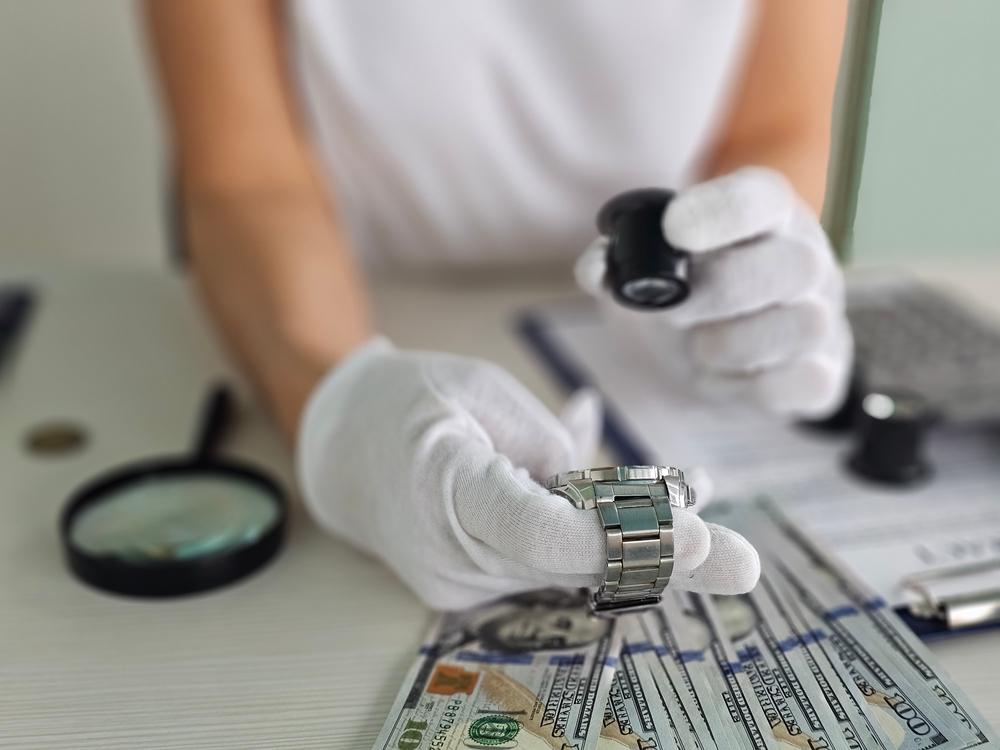 A professional appraiser determines how much a Patek Philippe watch is worth.