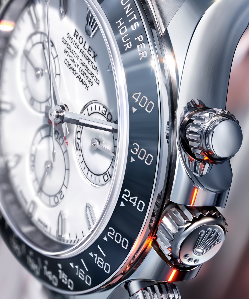 Close-up of the Rolex Daytona 126502 white Grand Feu enamel dial and anthracite Cerachrom bezel — tungsten carbide ceramic with platinum PVD tachymeter scale.