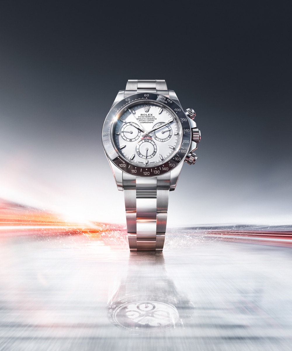 New Rolex Cosmograph Daytona ref. 126502 Rolesium — Oystersteel and platinum, white Grand Feu enamel dial, anthracite grey Cerachrom bezel, introduced Watches & Wonders 2026.