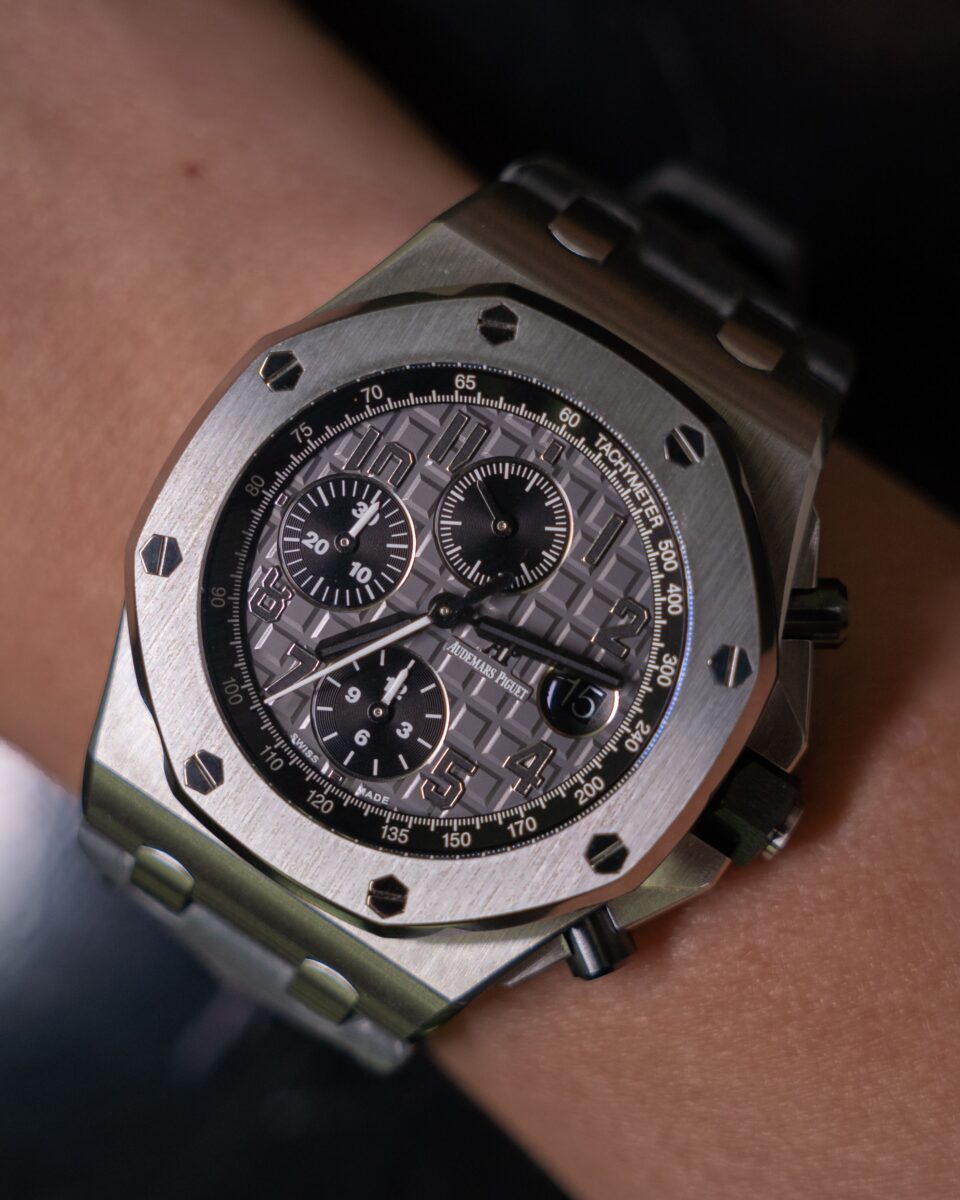 Audemars Piguet Royal Oak Offshore chronograph with a gray textured dial and octagonal bezel on a wrist.